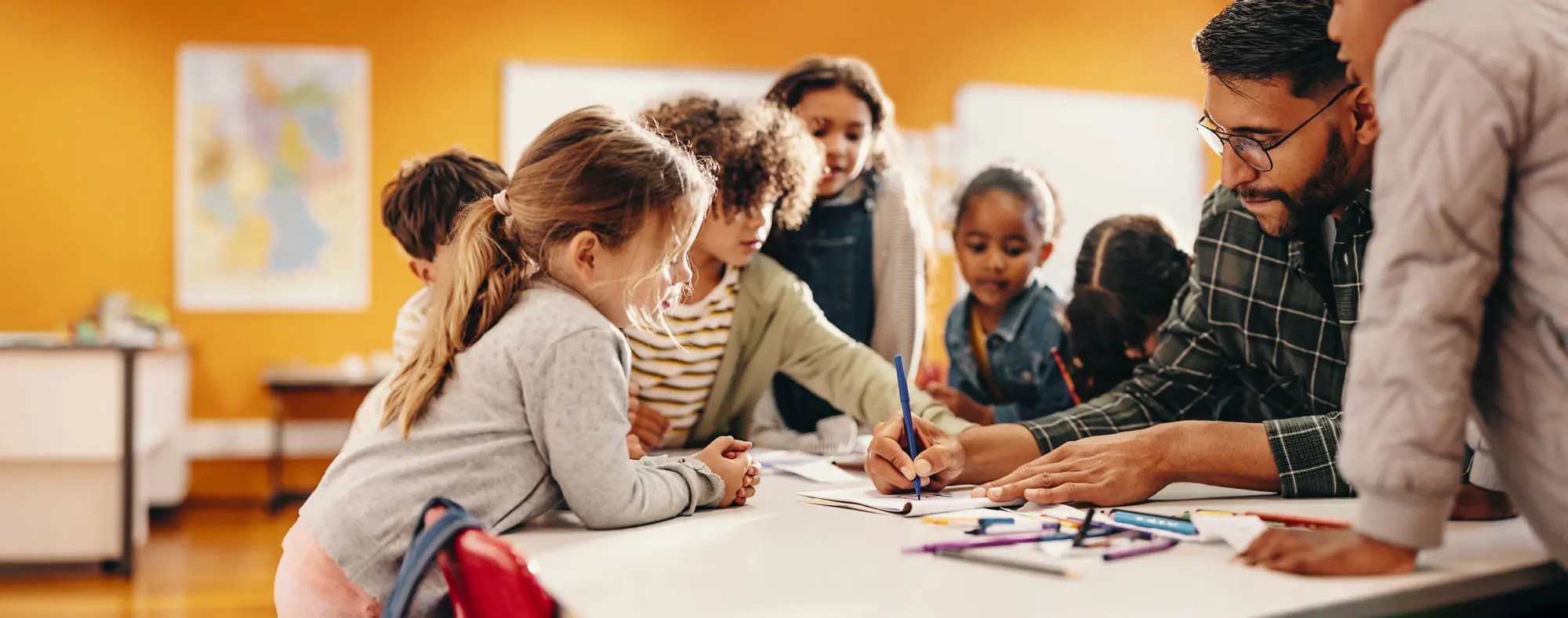 Amplify - Digital Marketing for Schools - Strategies for Private School Marketing Banner image - children studying with teacher