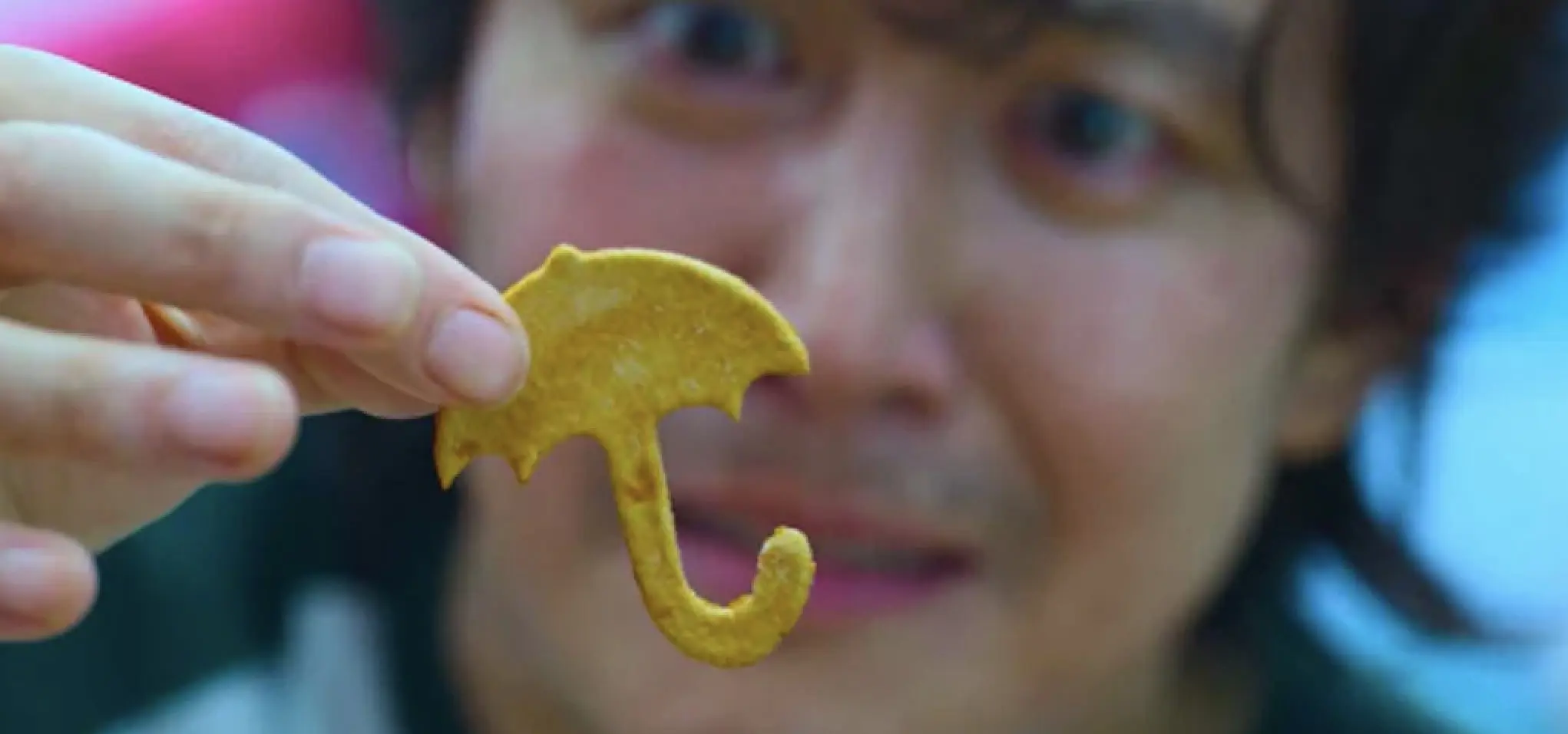 Amplify Marketing for Schools - Blog on School Marketing Budgets - Squid-game-umbrella-cookie