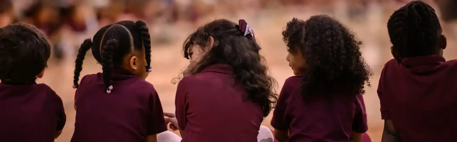Amplify - Digital marketing for schools - client success story banners - the walker school - kids watching the game