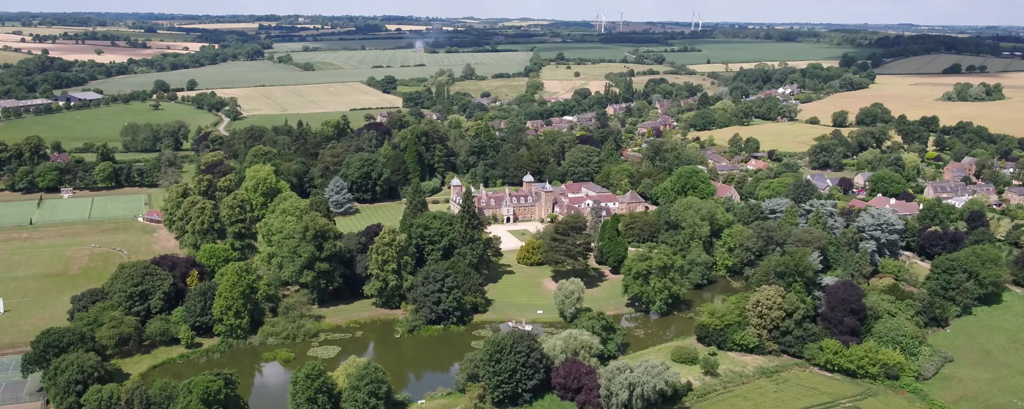 Amplify marketing for schools - blog banner - private school closures due to vat - maidwell hall school aerial photo